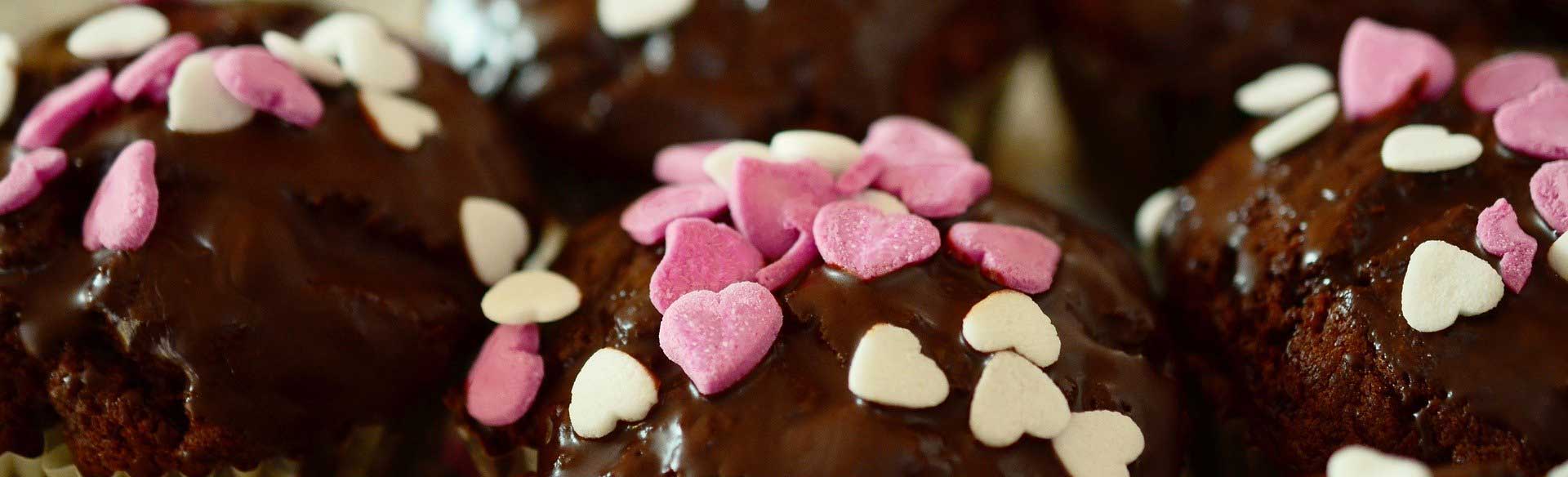 chocolate cupcakes with sprinkle hearts